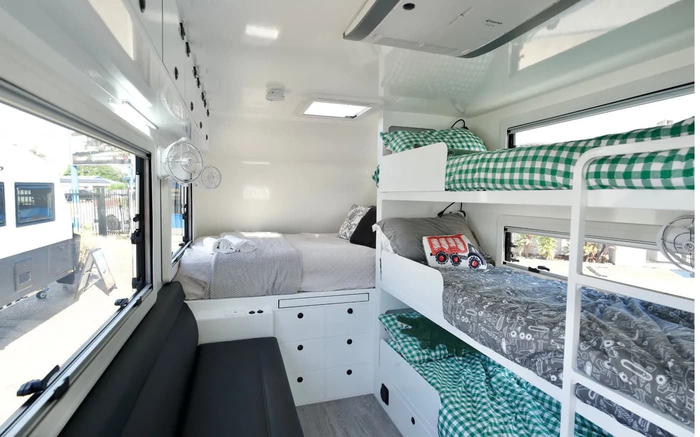 East West King Bed in the Nirvana 16' Hard Top Triple Bunk